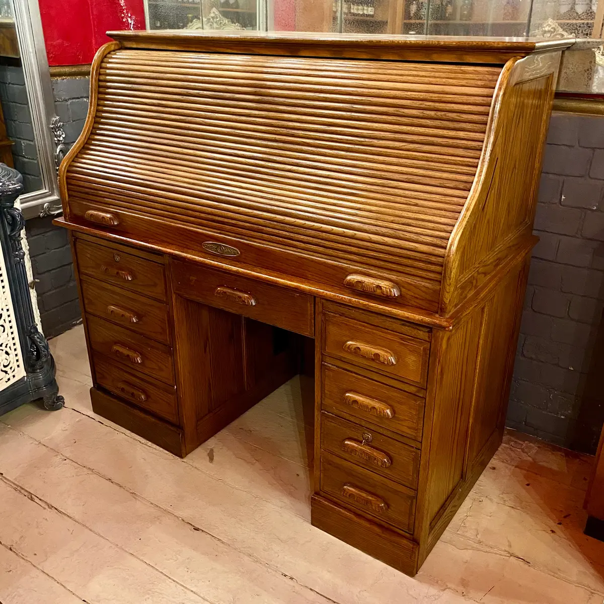 Large Vintage Teak Roll Top Desk With Brass Accents - Sold 1