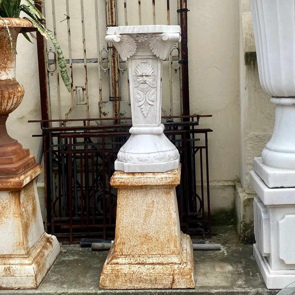 White Marble Plinths With Face Of Zeus 1