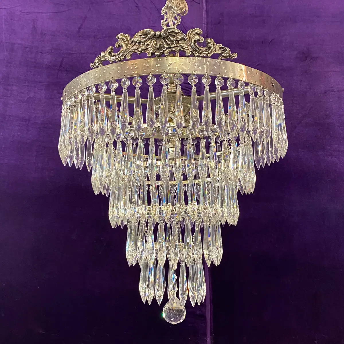 A Nickel And Crystal Waterfall Chandelier - Sold 1