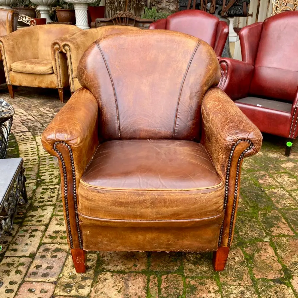 Distressed Tan Leather Armchair With Brass Studs - Sold 1