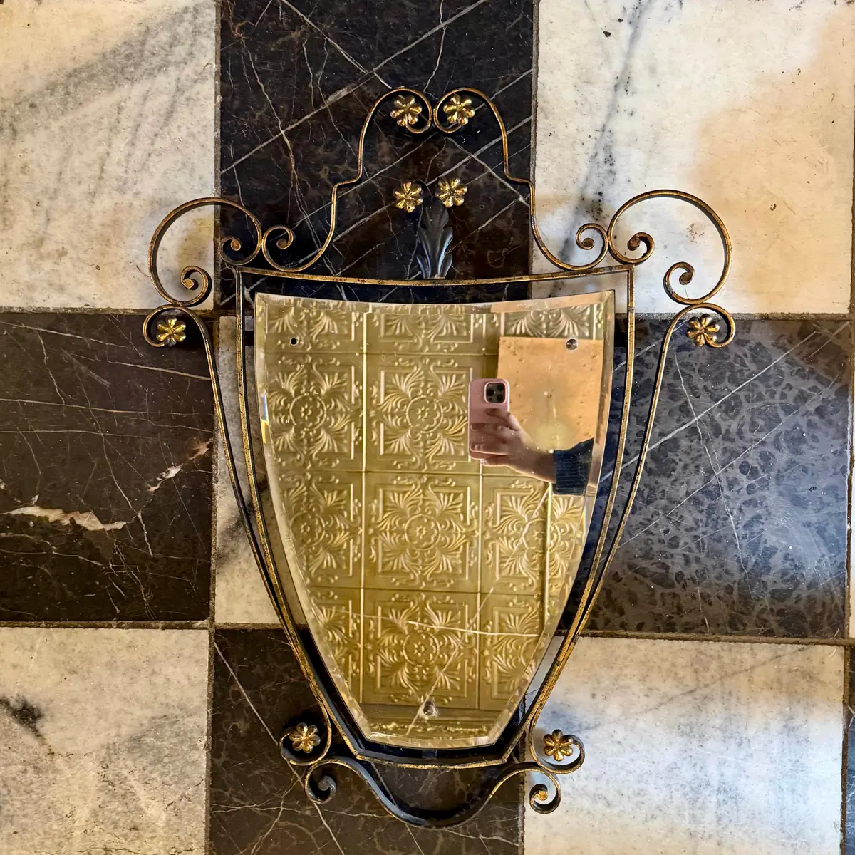 Wrought Iron Shield Mirror And Floral Adornments 1