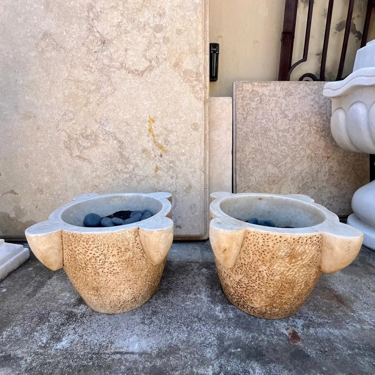 Pair Of Craved Marble Planters With Pitted Exterior - Sold 1